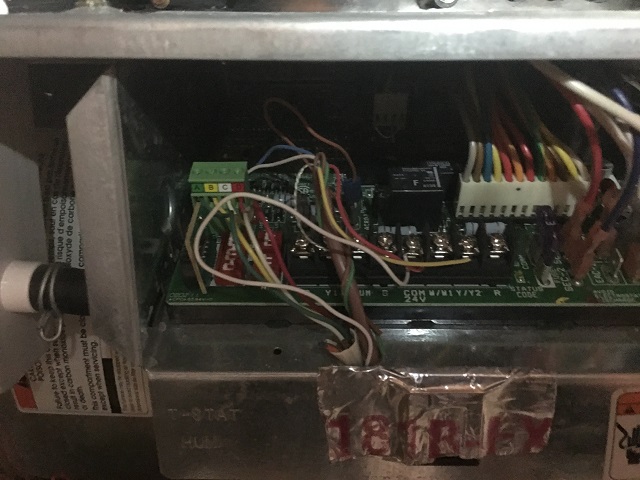 Wiring at the furnace showing the same four wires labeled A, B, C, and D