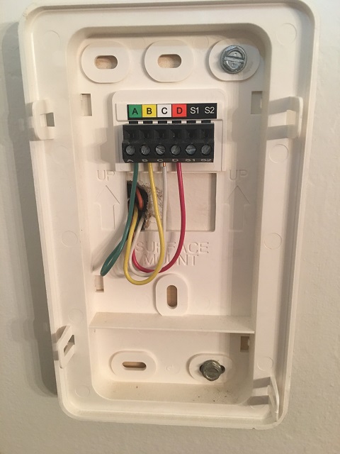 Thermostat wiring with four wires labeled A, B, C, and D